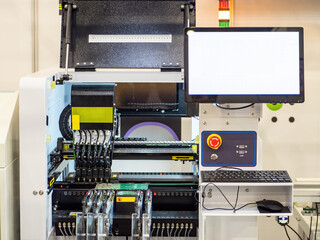 Poster - Production of computer boards. Machine for making microchips. PCB production at factory. Machine applies tracks to computer boards. Production equipment with monitor. Microelectronics industry