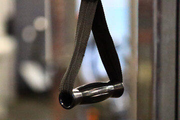 Poster - A close-up view of a luggage bag's handle, suitable for use in travel or transportation-related contexts.