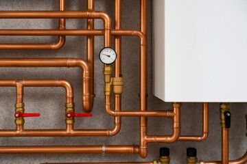 Poster - Copper pipes, valves, pressure gauge, and boiler providing hot water and heating