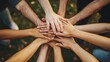 © Lakshmi - Diverse hands joined in a circle