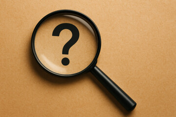 Poster - Magnifying glass searching answers mystery question mark on brown background