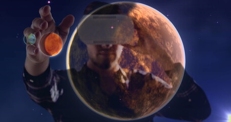 Poster - Using virtual reality headset, person exploring planets in space image