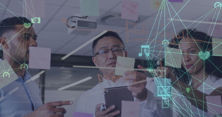 Poster - Image of network of connected media icons with business people brainstorming at a meeting