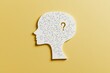 © AI04 - A yellow background features a brain puzzle with one piece missing, and a question mark created from puzzle pieces