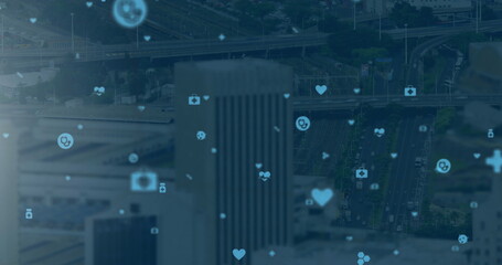 Poster - Image of digital icons over cityscape on blue background