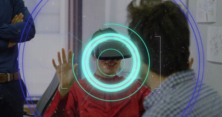 Poster - Neon scope scanner and light trails against caucasian man wearing vr headset at office