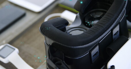 Poster - image of networks of icons moving over vr headset in background