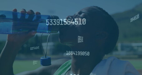 Poster - Image of digital data processing over male athlete drinking water