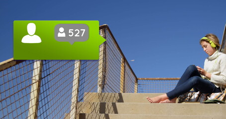 Aufkleber - image of speech bubble with people icon and numbers changing over woman using smartphone