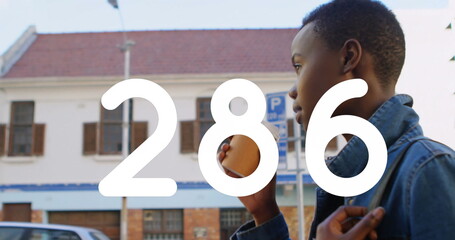 Poster - Image of numbers changing over woman drinking coffee