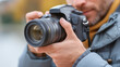 © MyDigitalCraft - Photographer capturing moments with a DSLR camera outdoors