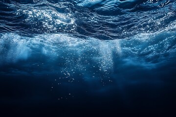 Aufkleber - Underwater View of Ocean Surface with Sunbeams and Bubbles in Deep Blue Sea Photograph : Generative AI