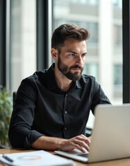 Poster - Young bearded businessman works on laptop in modern office. Confident entrepreneur analyzes data, looks at monitor. Pro uses computer, technology, typing. Consultant, manager working on project,