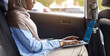 © Prostock-studio - Black Muslim Businesswoman In Headscarf Using Laptop In Car While Going To Work, Sitting On Backseat Of Taxi, Traveling With Personal Driver, Female Executive Working With Notebook On Way To Office
