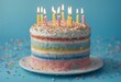 © sandra - cake birthday colorful background blue sprinkles candles ten occasion sprinkle dessert decorated colourful candle sweet delicious bright icing festive fun joyful happy playful treat cheerful frosting