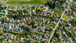 © Monet_P - Top-down drone shot of a suburban neighbourhood in Rancho Palos Verdes, California. The image shows residential homes with green lawns, trees, and organized streets in Los Angeles County.