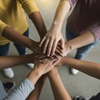 © Sharmin eps - People in a circle holding hands together show teamwork and unity