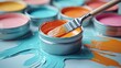 © ahmad - Paintbrush in vibrant paint cans.