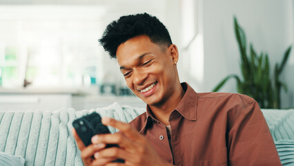 Poster - Funny, phone and happy man laughing in home on social media application or texting on weekend. News, meme or male person with smile on mobile message on sofa for comedy post, chat or dating website
