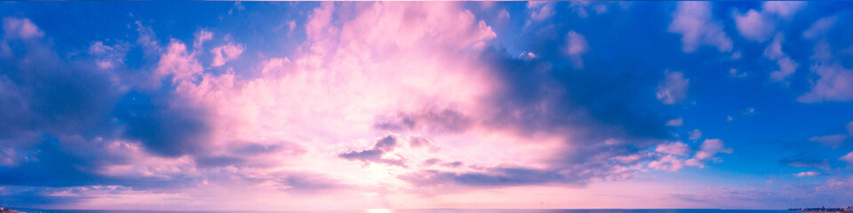 Wall Mural - seascape in the evening from above. panoramic aerial view of a spit in the sea during sunset. desert