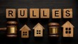 © Stock by Anindya - Blocks with the word Rules, a judge's gavel and miniature wooden houses. laws, regulations, and guidelines that govern the buying, selling, leasing, and managing of property. Flat.