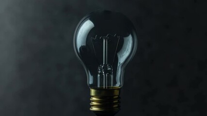 Poster - Illuminating Idea: A gleaming lightbulb, its glass surface capturing the play of light, symbolizing an ingenious moment and boundless creativity.