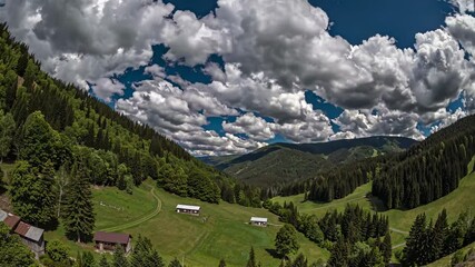 Aufkleber - Explore lush green valleys and dramatic clouds in a serene mountain landscape during a bright summer day in Germany