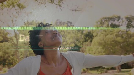 Poster - In nature, woman surrounded by digital data transfer animation overlay