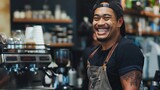 Cheerful barista wearing apron and cap standing in coffee shop. Small business owner.
