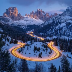 Wall Mural - Majestic Dolomites Mountain Range at Dusk with Winding Road and Car Light Trails Through Snowy Winter Landscape