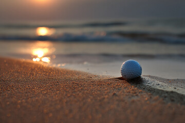 Poster - Golf ball on sandy beach at sunset, ocean background, serene and peaceful scene, representing relaxation and tranquility