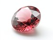 Exquisite oval cut rhodolite garnet gemstone sparkling on white background showcasing its facets and clarity with studio lighting for jewelry design