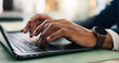 © WestLey/peopleimages.com - Laptop, hands and businessman in office with keyboard for research with finance report for planning budget. Typing, tech and closeup of male financial manager with online investment for company.