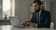 © Phung - Focused businessman makes online payment using laptop. AI Generated