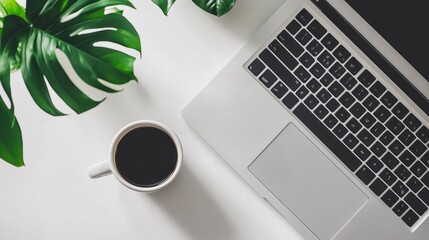 Poster - A serene desk setup showcasing a sleek laptop paired with a black coffee cup, complemented by vibrant green plants, promoting creativity and focus in a minimalist environment