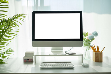 Aufkleber - Modern workspace desktop computer with a blank white screen, perfect for design mockups or presentations.