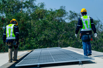 Wall Mural - team of professionals installs solar panels, ensuring energy efficiency and sustainable development.