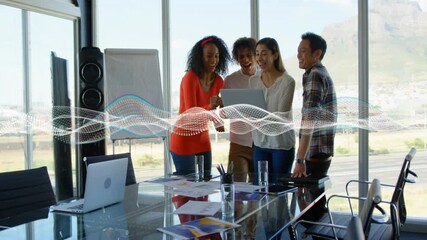 Poster - Diverse group collaborating on laptop with digital wave animation over office scene