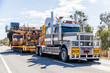 © Austockphoto - Over size load on truck transporting mining equipment