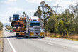 © Austockphoto - Over size load on truck transporting mining equipment