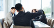 © BuyOutFelix01/peopleimages.com - Back, business man and discussion in meeting for financial compliance, budget monitoring and performance feedback. Finance delegate, collaboration and people in office for internal audit and planning