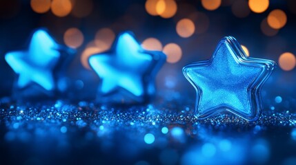 Poster - Three glowing blue star shapes on a sparkly blue surface with bokeh lights.