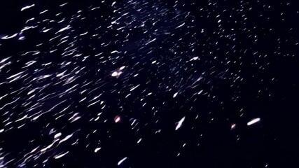 Wall Mural - fireworks in the sky, Witness a mesmerizing display of stars and cosmic dust illuminating the night sky over a tranquil landscape. The celestial wonders create a breathtaking atmosphere full of beauty