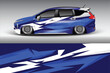 © riyal - Sleek blue and white car design showcasing a lowered vehicle with dynamic graphics on a gradient background