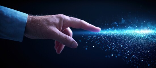 Poster - A hand gently touching a vibrant stream of digital particles with a glowing effect.