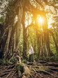 © tashka2000 - Woman near Giant Fig Tree in Bali Botanic Garden
