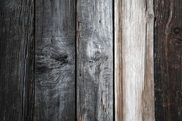 Aufkleber - Close-up of weathered gray, brown, and white wood planks, showcasing vertical grain texture and natural variations in color, ideal for rustic backgrounds or design elements