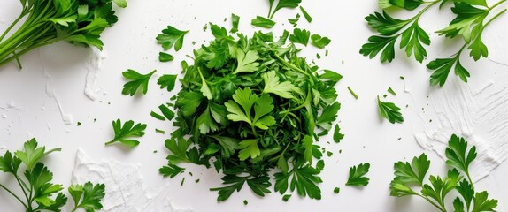 Poster - Isolated chopped fresh green parsley leaves on white background, overhead perspective