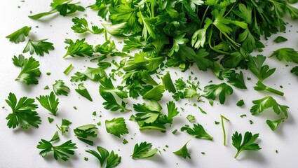Poster - Isolated green parsley leaves, freshly chopped, on a white background from above