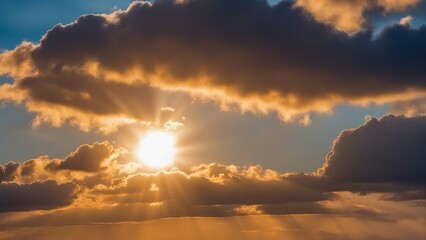 Wall Mural - clouds and sun under a cloudy sky